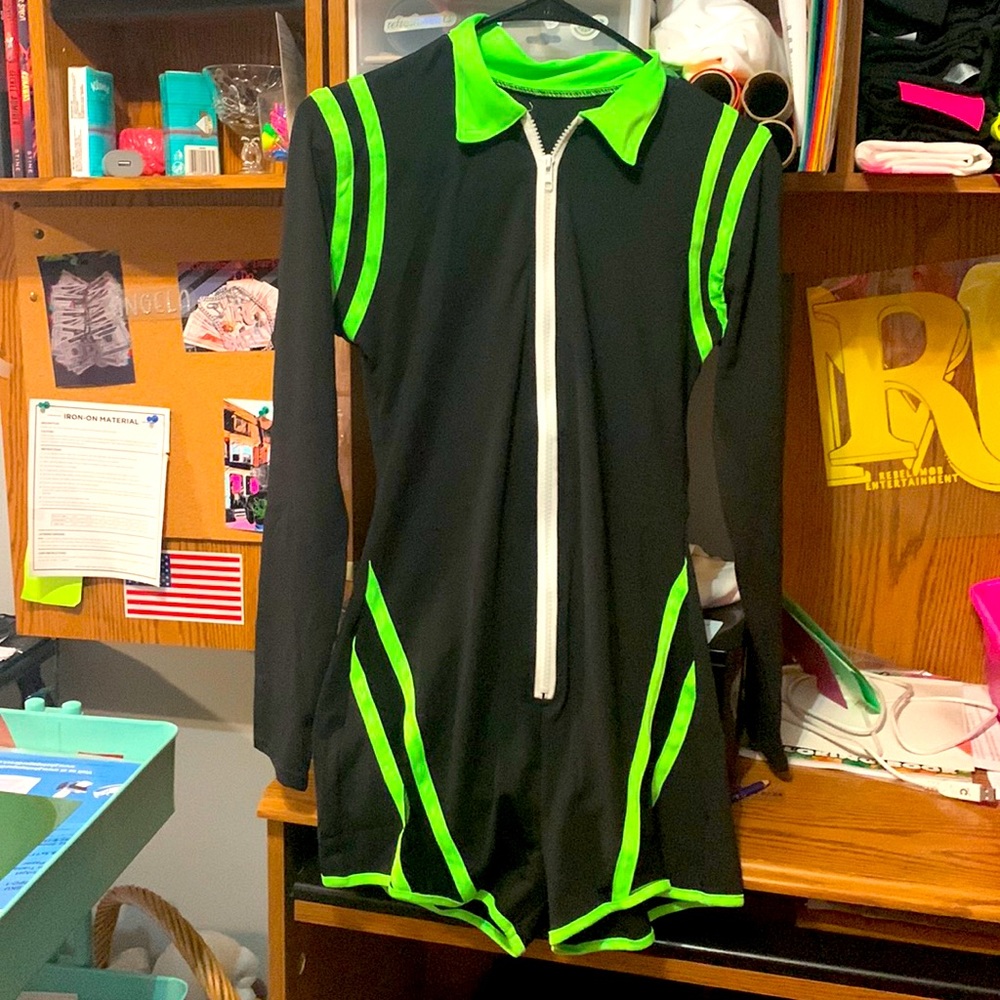 I am selling a shorts romper. Very vivid neon green also has long sleeves.
